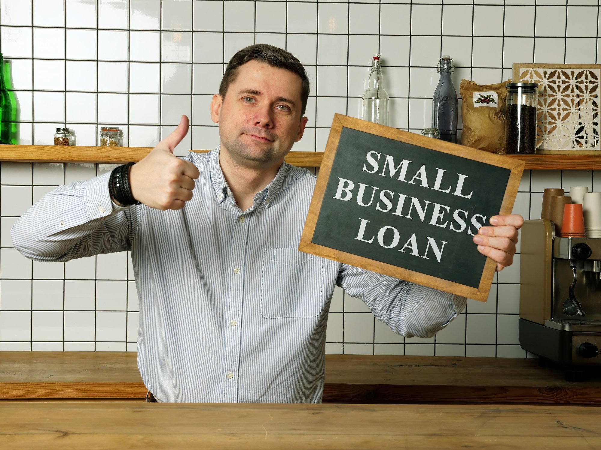 Small business loan in the businessman hands.